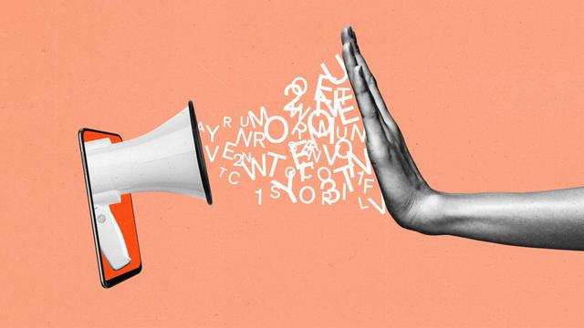 Megaphone emerging from mobile phone spews barrage of letters while a hand blocks the flow.