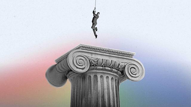 A man holds a rope dangling above a large judicial column.