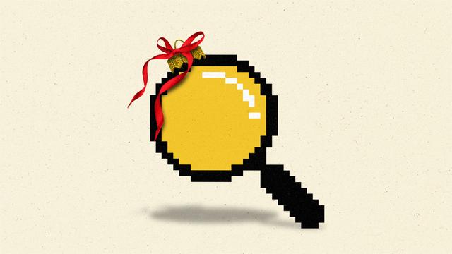 Pixellated magnifying glass doubling as a Christmas bauble.