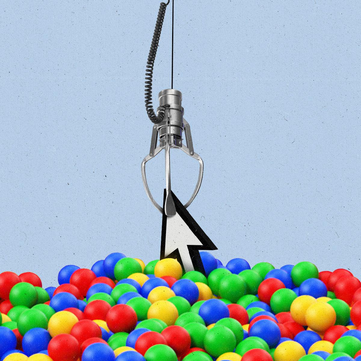 A claw machine claw pulling a cursor out of a ball pit filled with red, yellow, blue and green balls.