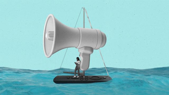 A boat that looks like a CTV remote with a speaker as sails floats on water.