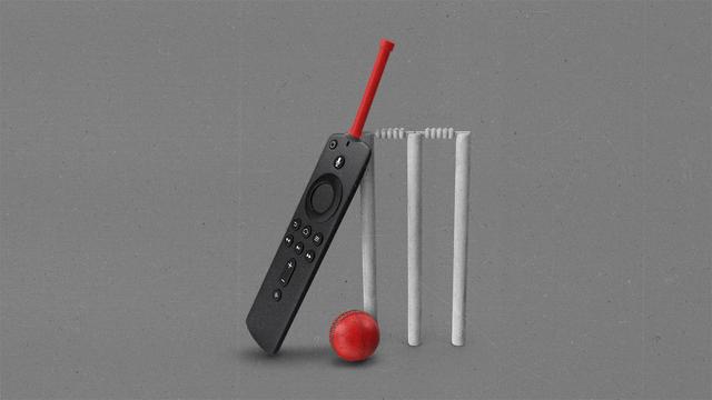 A TV remote doubles as a cricket paddle as it taps a red ball.