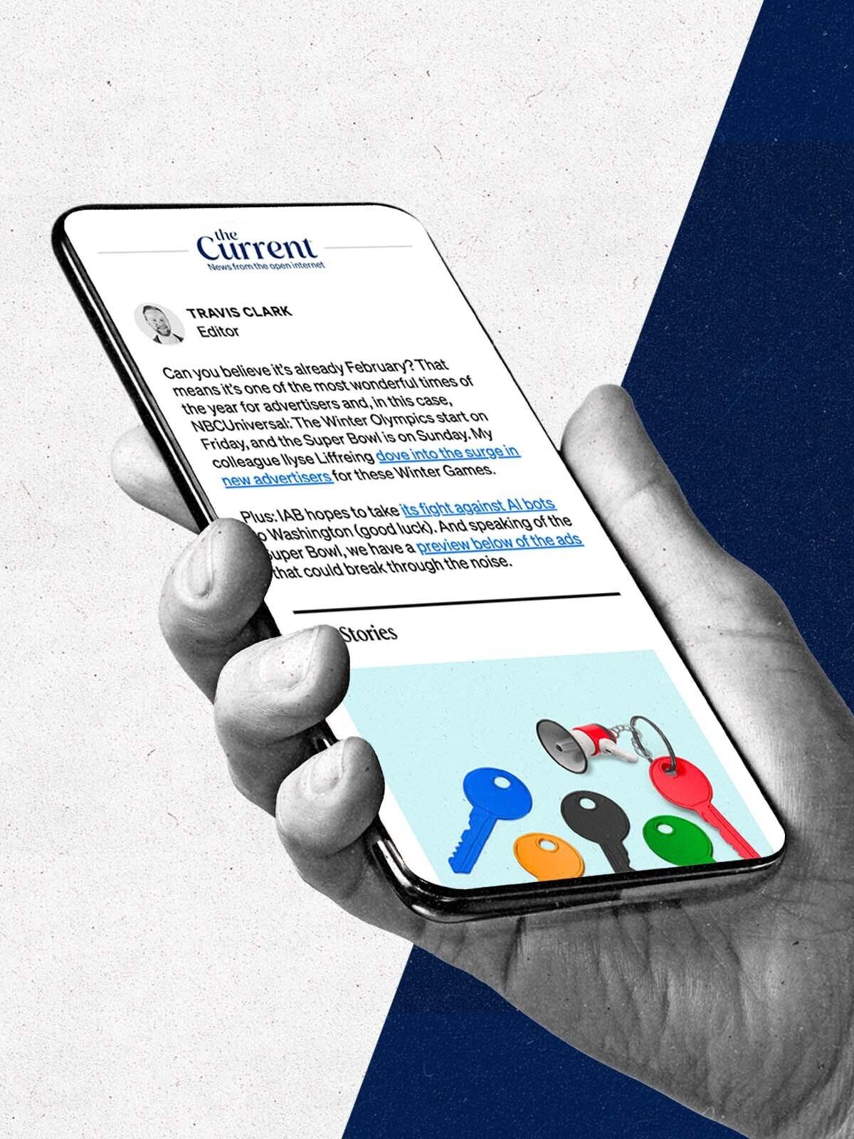 Hand holds a phone with The Current newsletter showing on the screen.