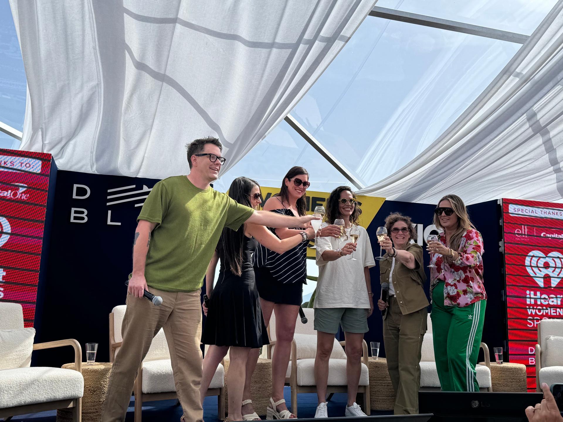 Bobby Bones, Kory Marchisotto, Sue Bird, Gayle Troberman and Laura Correnti toast the launch of iHeartMedia's new Women's Sports Audio Network.