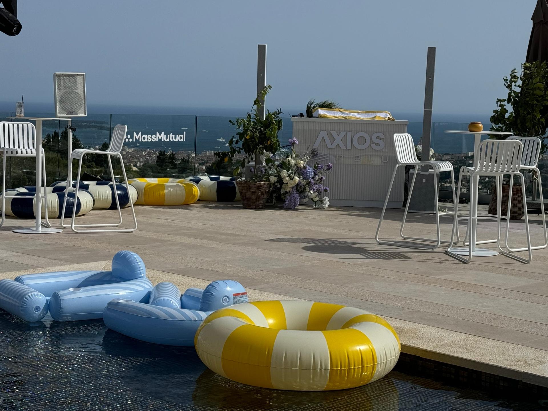 Image of a pool with pool floaties inside taken at the Axios Sports House at the Cannes Lions festival.