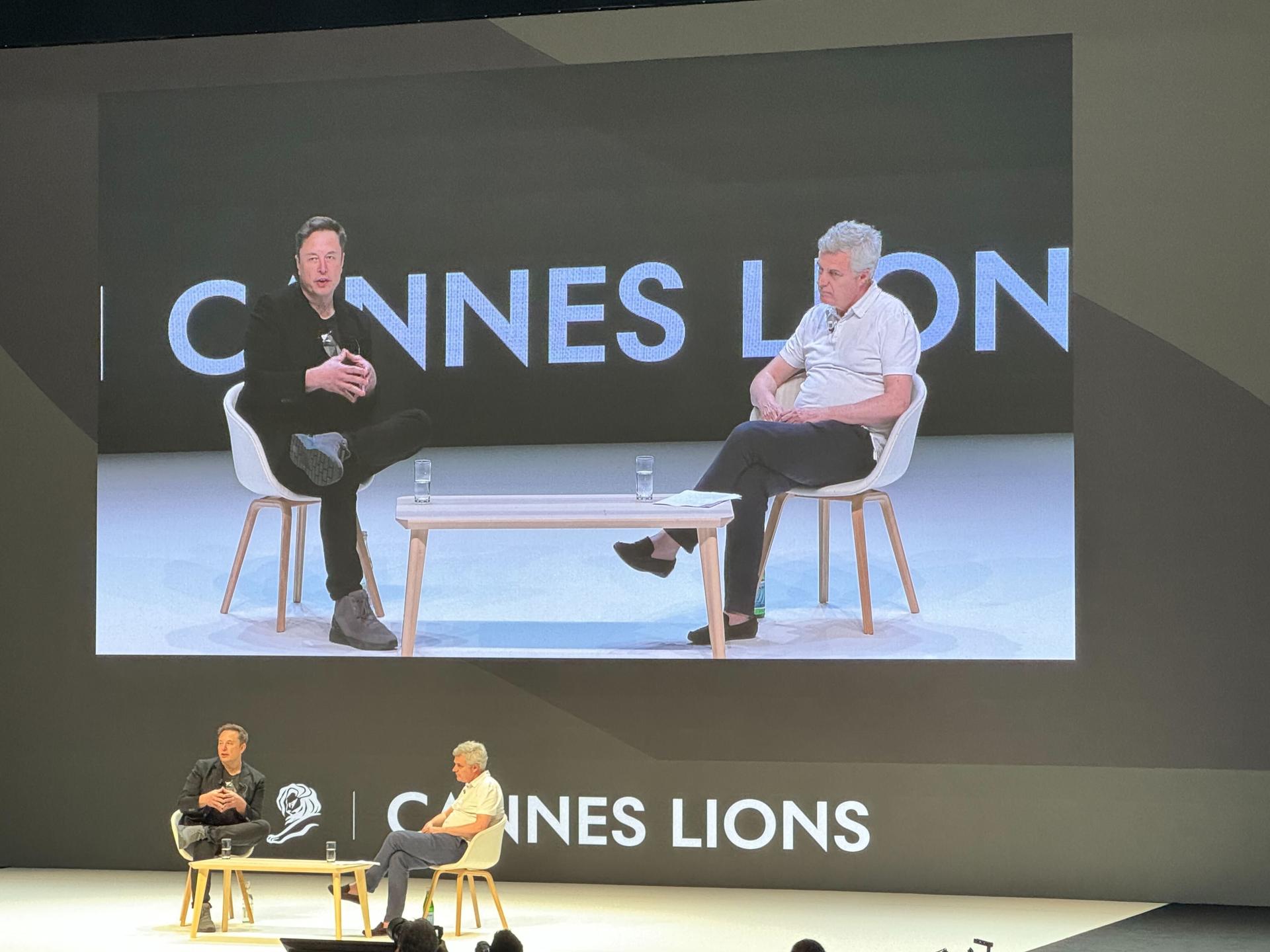 Image of a Cannes Lions 2024 panel including Elon Must and Mark Read in conversation.