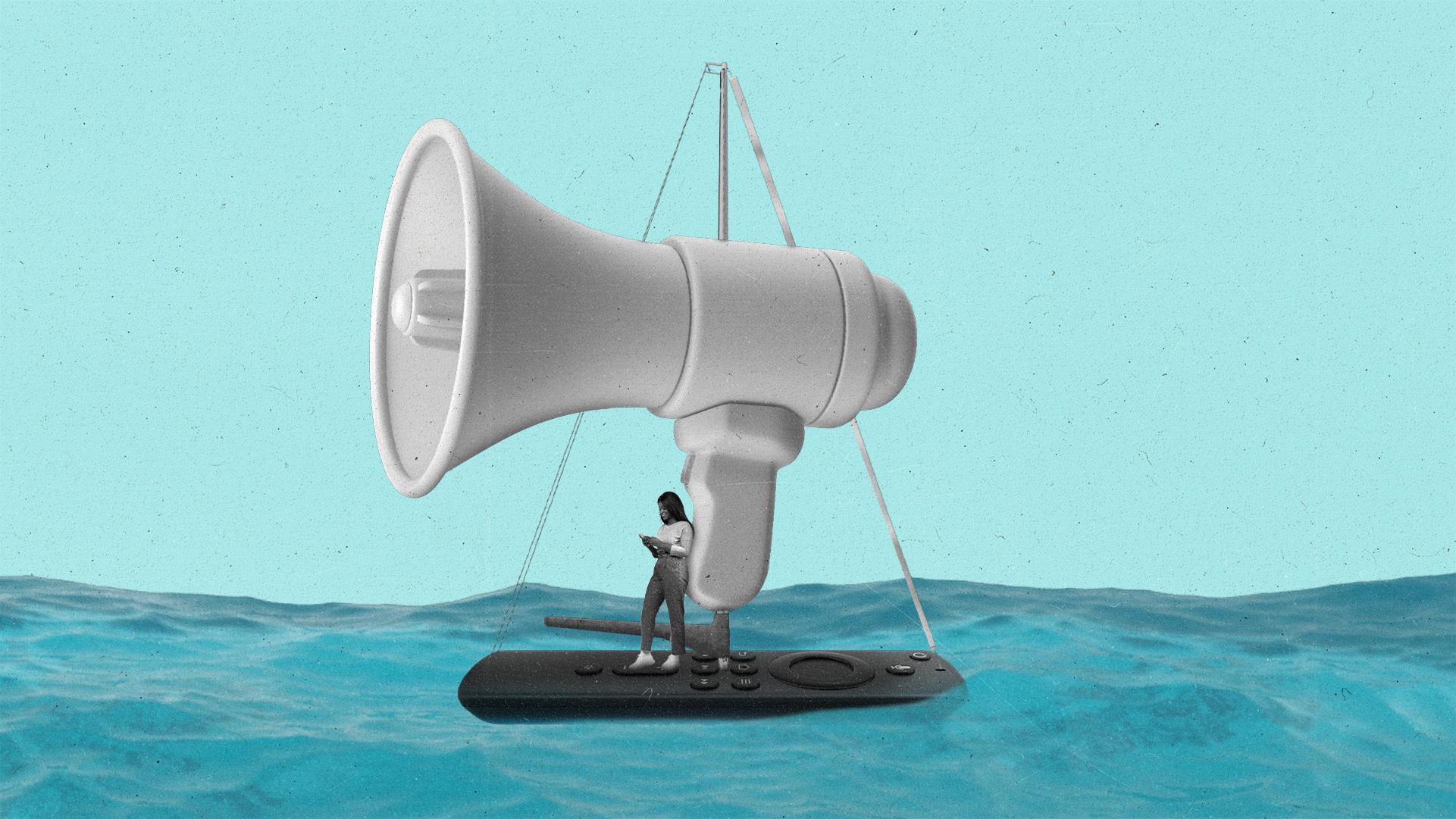 A boat that looks like a CTV remote with a speaker as sails floats on water.