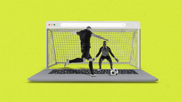 An athlete on-top of a keyboard kicking a soccer ball towards a goal guarded by a goalie.