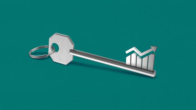 Silver key with a bar chart and upward trend line as the teeth.