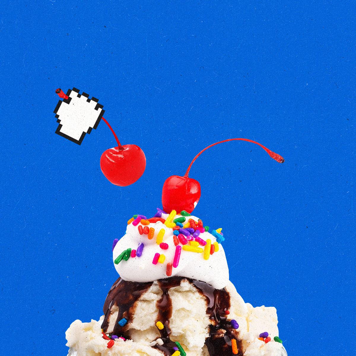 Cursor hand placing a second cherry on top of an ice cream sundae.