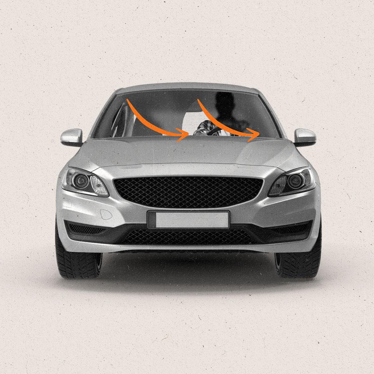 A forward facing car with fogged windshield being wiped by orange wipers in the shape of orange arrows.